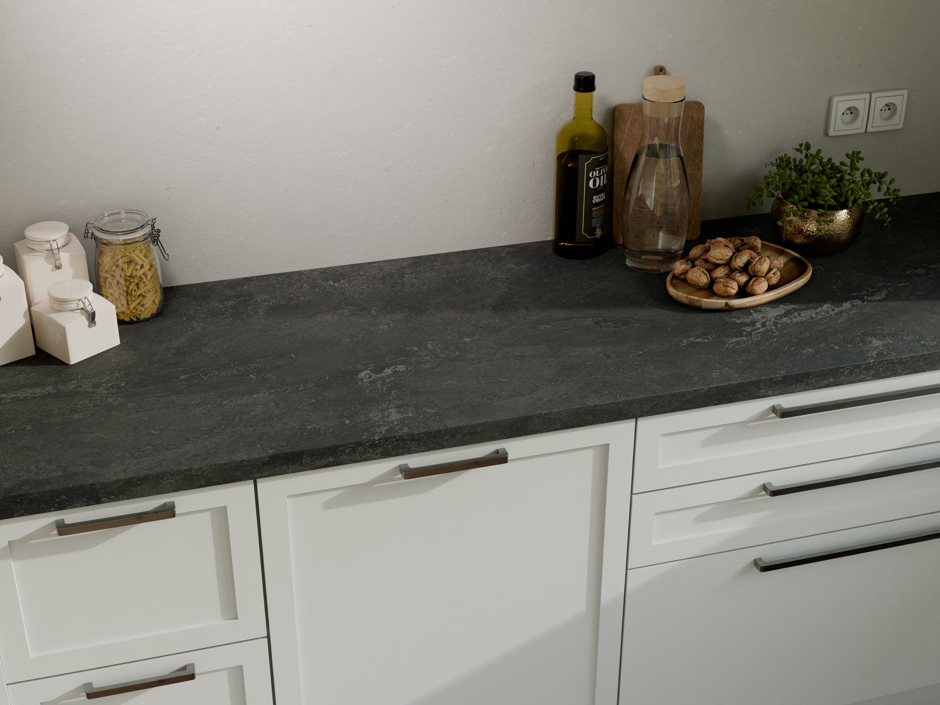 Plan de travail stratifié sur mesure Sofema en noir avec des ustensiles.